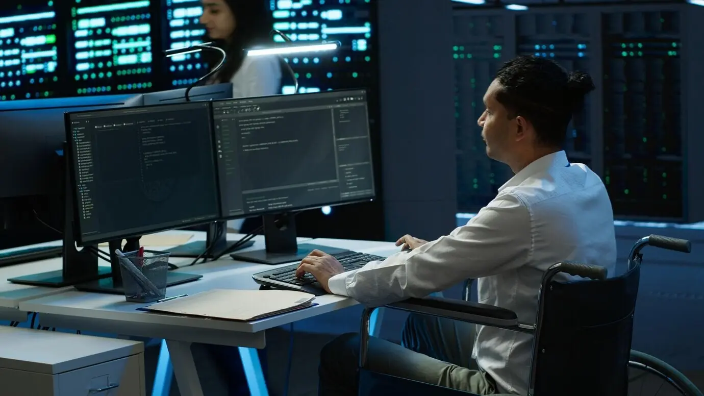 A wheelchair user safeguarding data center hardware equipment